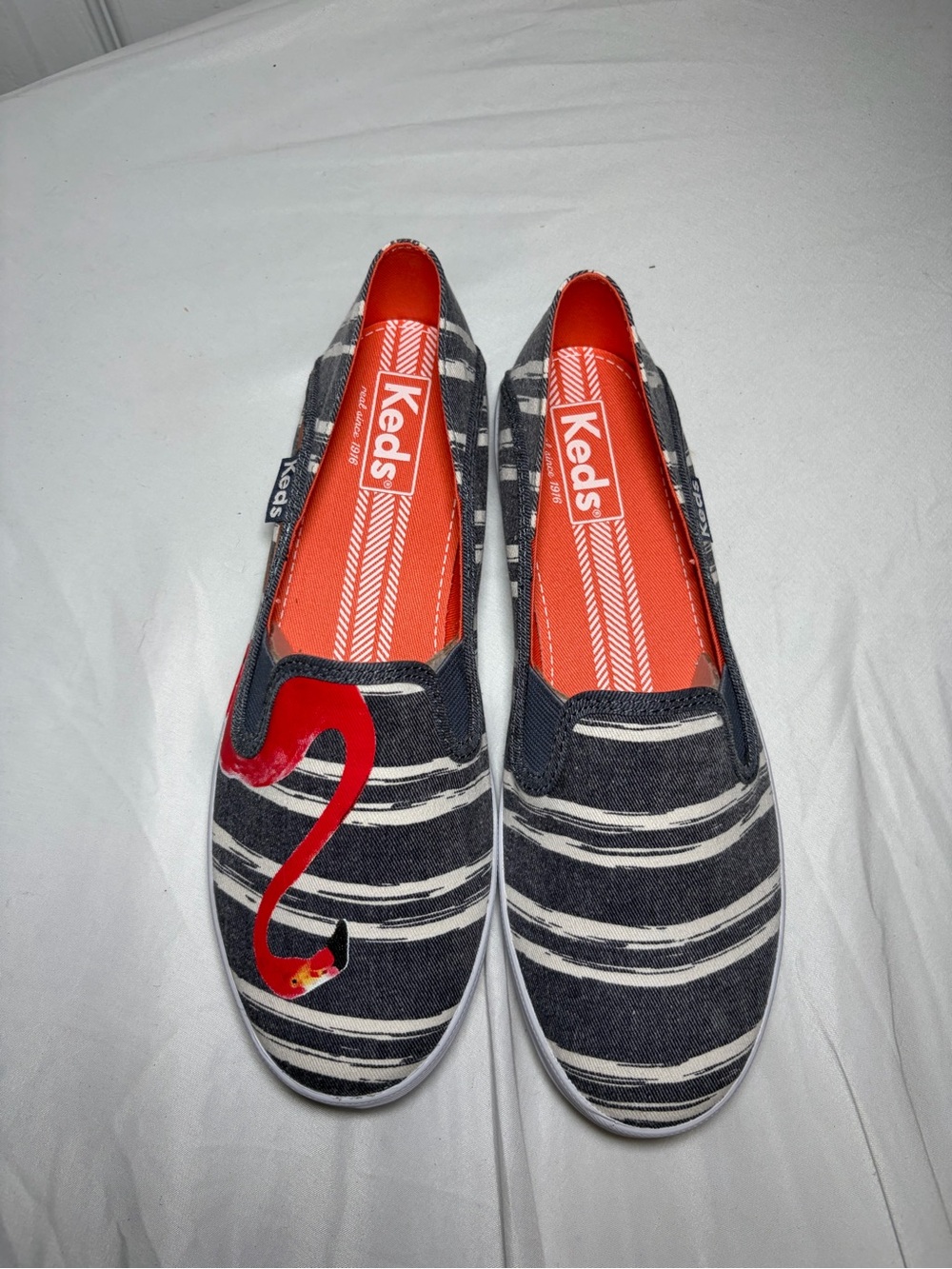 Keds Navy and White Striped Slip-On Sneakers with Red Insole